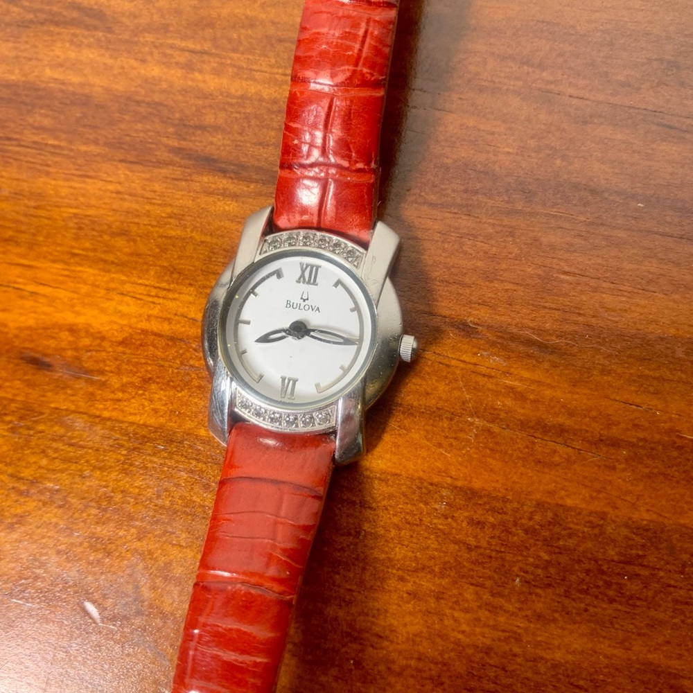 Bulova women’s watch with red leather band